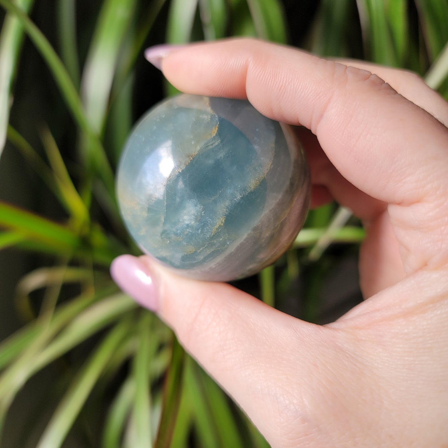 Blue Onyx Sphere: A Gemstone of Strength and Serenity