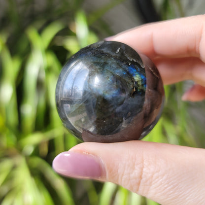 Labradorite Sphere: Mystical Radiance and Cosmic Harmony