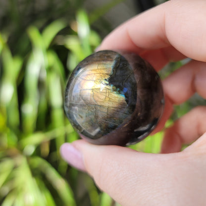 Labradorite Sphere: Mystical Radiance and Cosmic Harmony