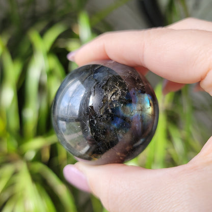 Labradorite Sphere: Mystical Radiance and Cosmic Harmony