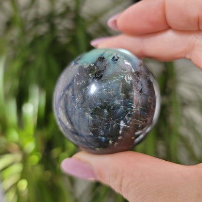 Labradorite Sphere: Mystical Radiance and Cosmic Harmony